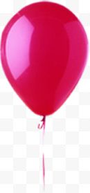 升在天空中的粉红色气球