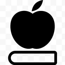 放在书籍上的苹果