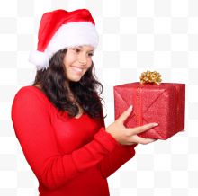 女孩戴着红色的圣诞老人帽礼物盒的形象